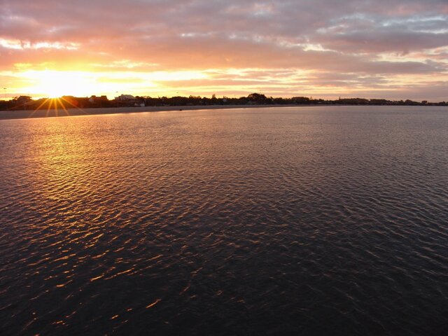 Foto do por do sol na praia do Laranjal